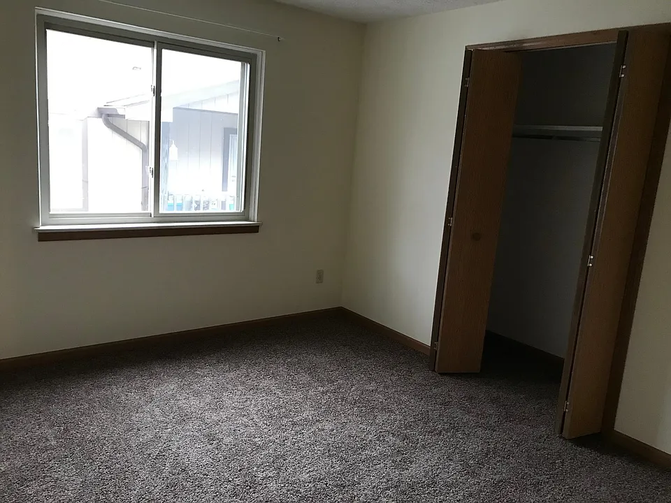 Second bedroom with standard closet.
New carpet.