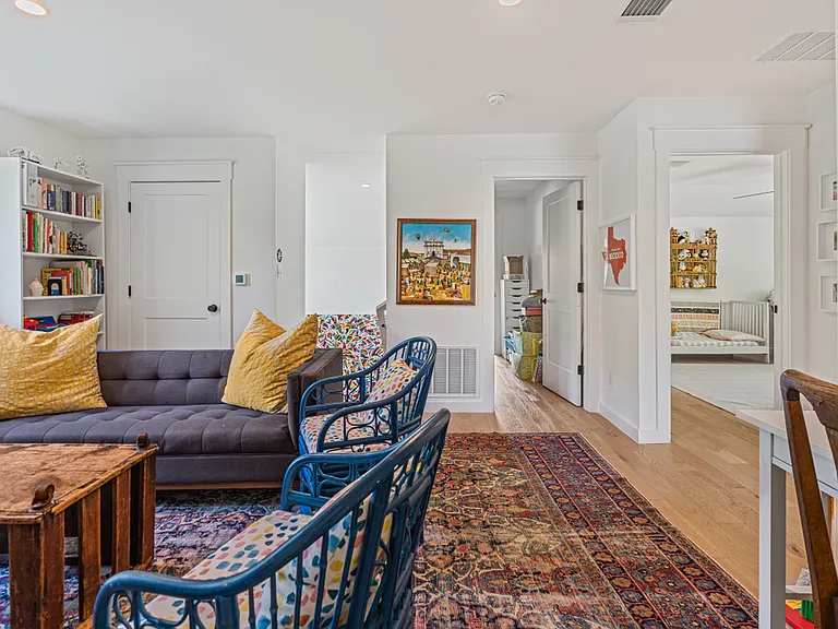 upstairs family room with views into bedroom and hallway to office