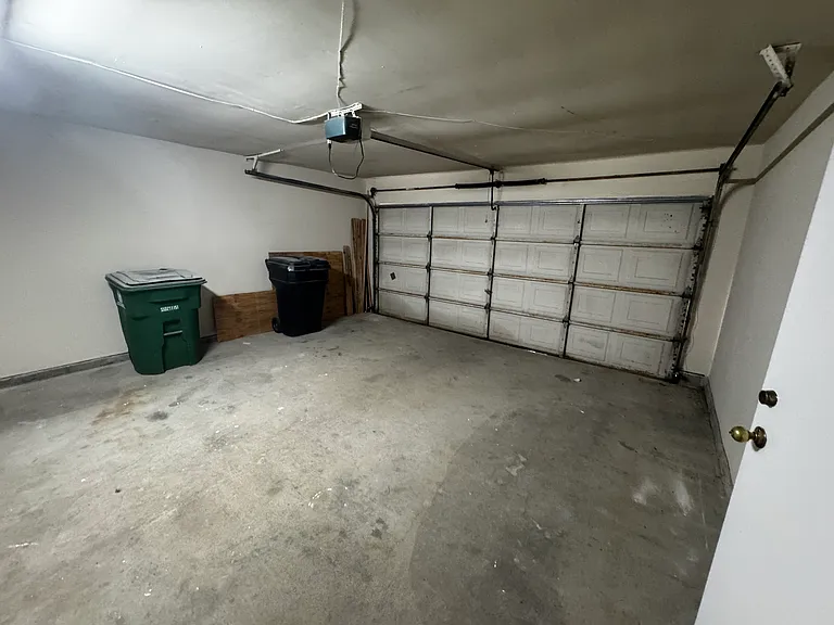 HUGE 2 car garage with extra storage area.