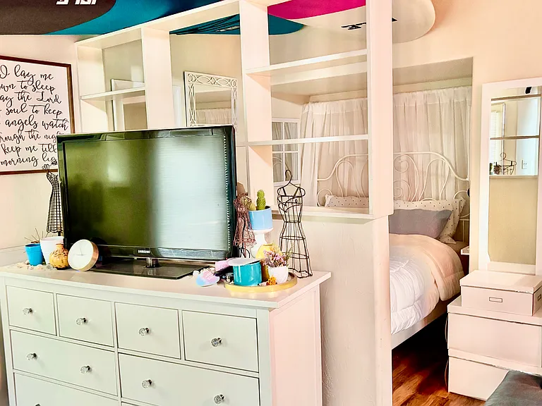 Bookcase/bedroom view