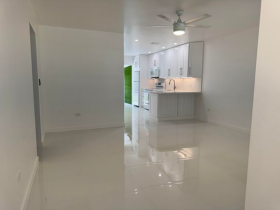 Living room looking into kitchen