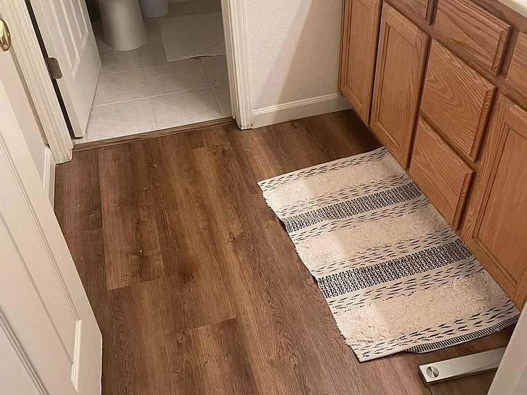 New luxury vinyl floor in the Hallway bathroom (installed June 2021)