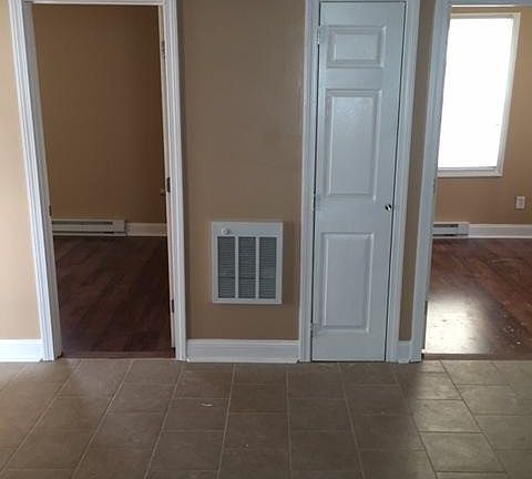 Entrance to two bedrooms from kitchen