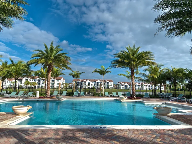 Venetian Style Pool with Cabanas and Fountain