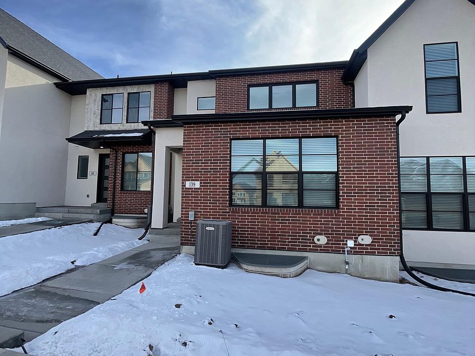 Exterior of unit with private off-street entrance.