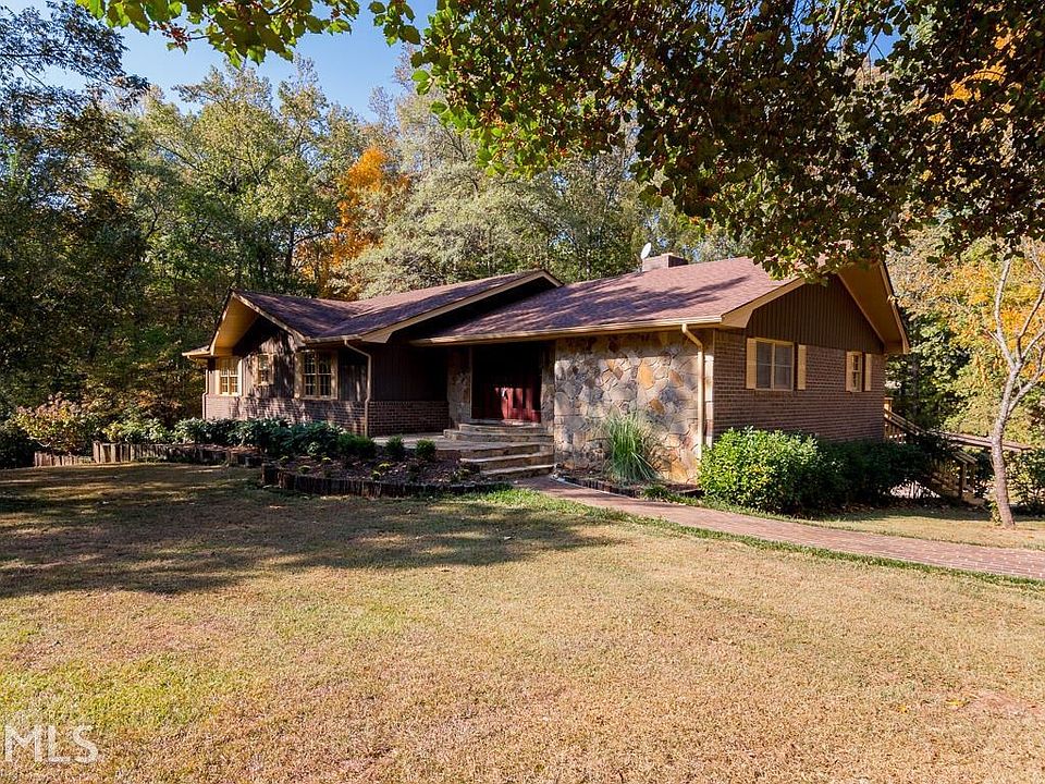 Brick 4 sides. 1.27 acres including extra lot in sale of house. Lots of privacy. Cul de sac. Approx 
