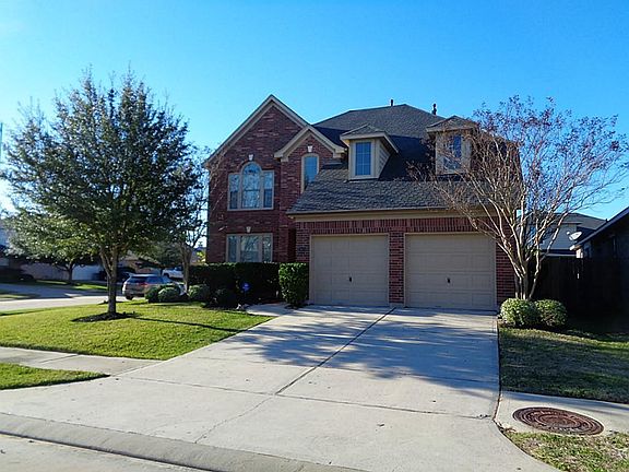 Front of House. This wonderful home on a desirable corner lot affords open space, is light and bright, and a very flexible, open floor plan, perfect for a Fgrowing Family and great entertaining/, too.