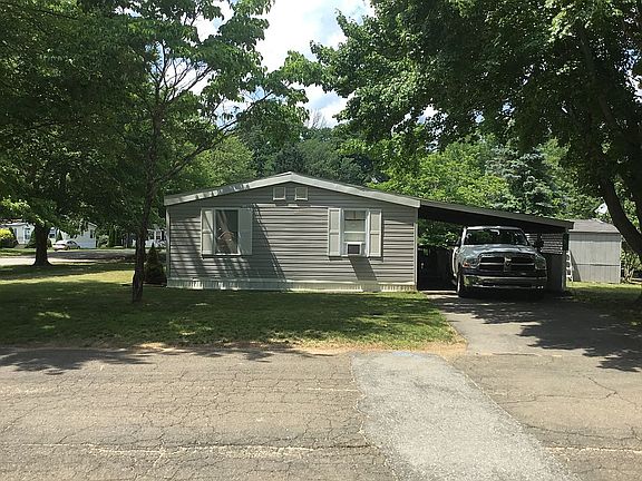 Side View w/ Carport