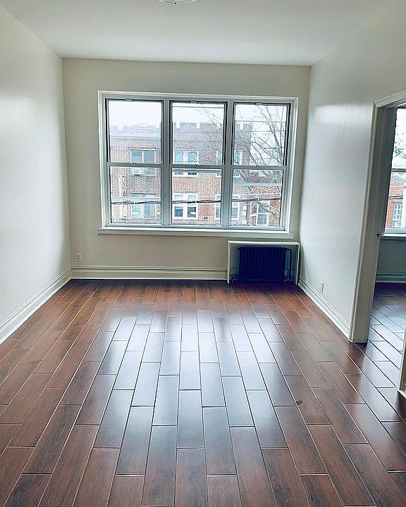 new floors and freshly painted flexible 3rd bedroom or 2nd living room