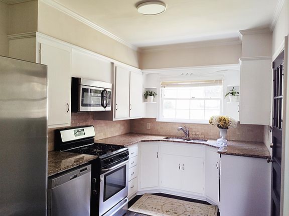 Kitchen with stainless steel appliances