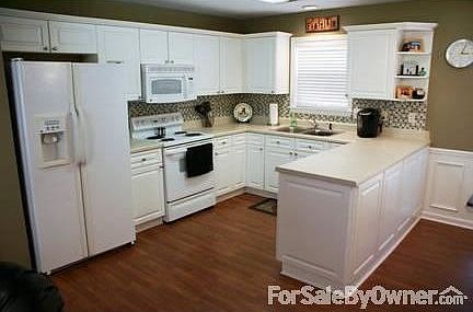 Kitchen
						:
						Open floor plan kitchen w/loads of counter space and cabinets for storage