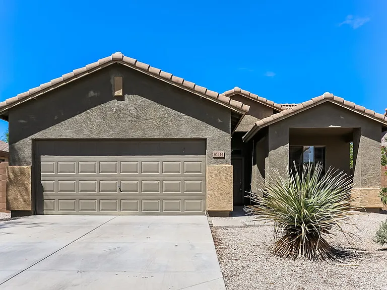 10314 W Pioneer St — Photo 1