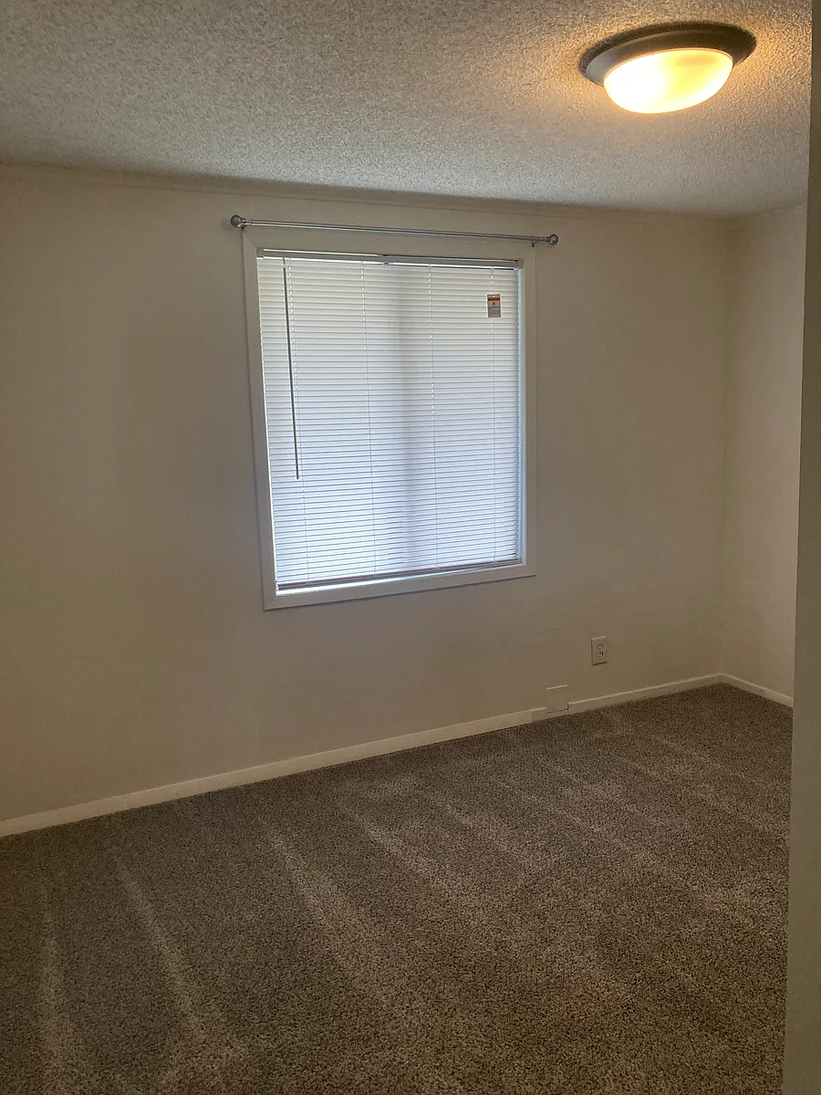 Apartments come with bedroom and living room blinds for privacy - Willow Way Apartments