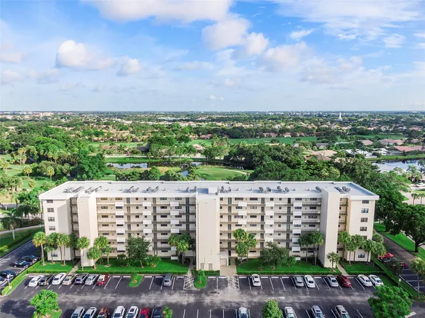 2400 Deer Creek Country Club Boulevard #202, Deerfield Beach, FL 33442