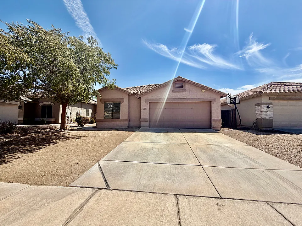 9323 W Harmony Ln