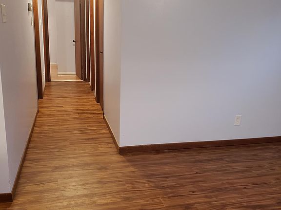 Hallway to the three bedrooms