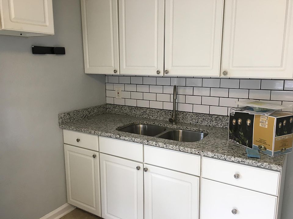 Kitchen sink- Granite Countertops. Stainless Steel appliance