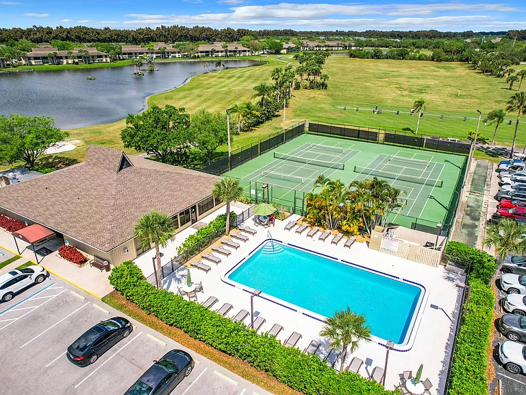Clubhouse, 1st heated pool, pickle ball/tennis courts + so much more to enjoy!