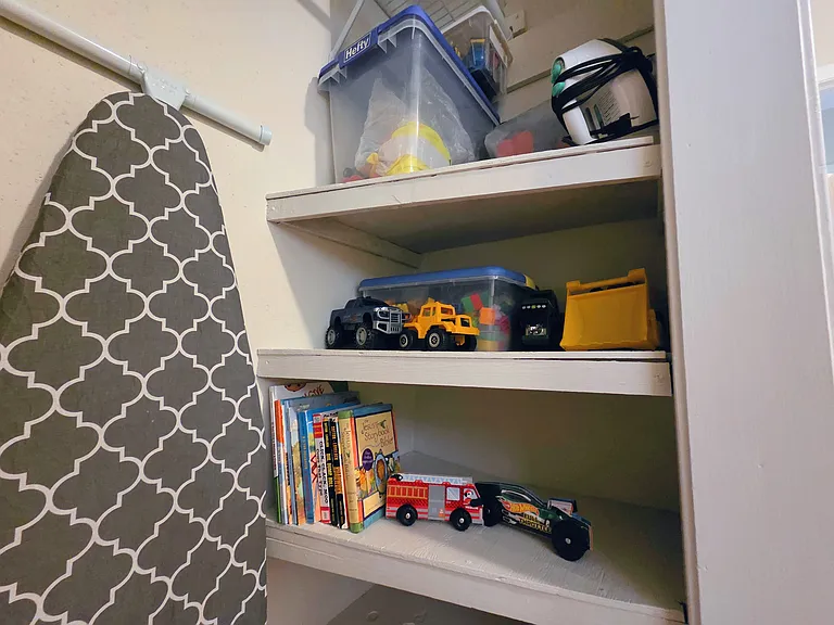 Toys in King Size Bedroom Closet
Iron & Ironing Board