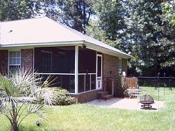 Backyard with screened in porch