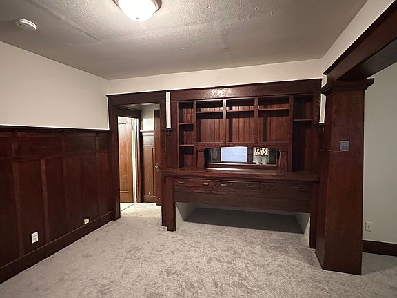 Dining and bathroom door, entry to the right.