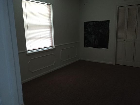 one of the bedrooms that has two doors to it 