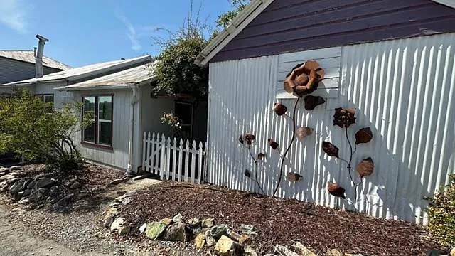 if you like country charm this is the DUPLEX for you...all new windows throughout..renovated 1 1/2 yrs ago..