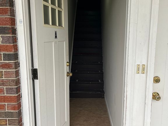 As you first enter, there is a flight of stair going to the 2nd floor