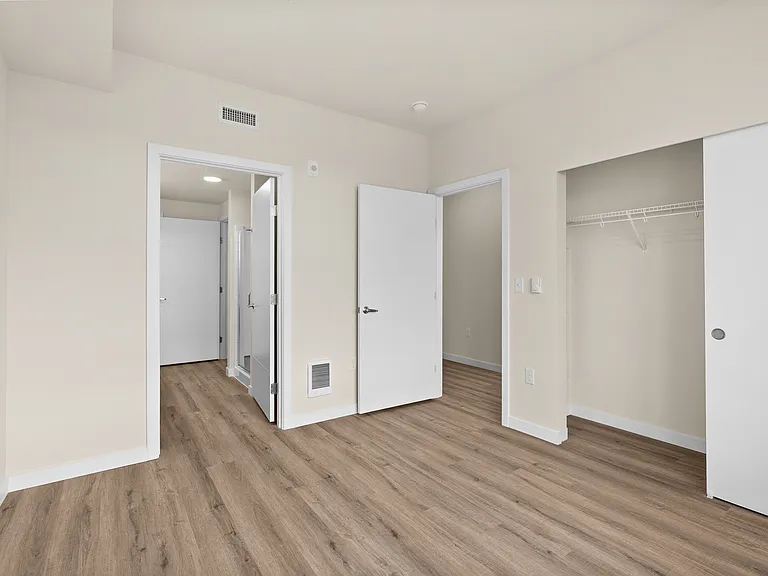 Comfortable bedroom with closet and bathroom access. Comfortable bedroom with closet and bathroom access.