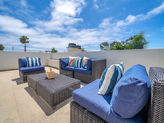 Roof deck patio with ocean views (furniture not included).