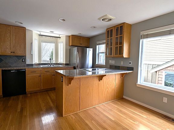 Kitchen, dining area. Full pantry, induction cooktop.