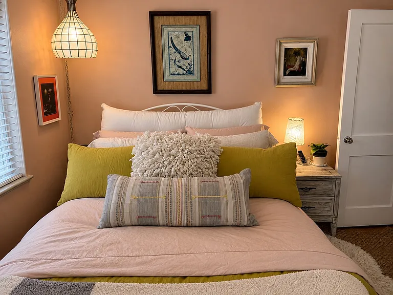 Bedroom 1 showing queen size bed with night stand