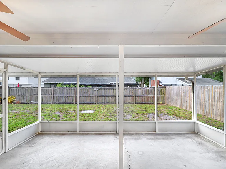 Florida living at its finest with a large screened-in lanai