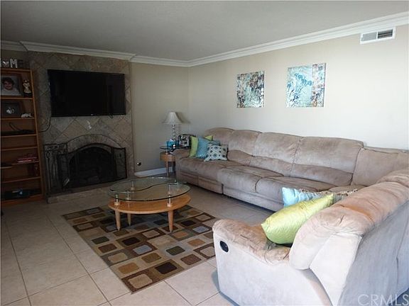 Family room with marble fireplace
