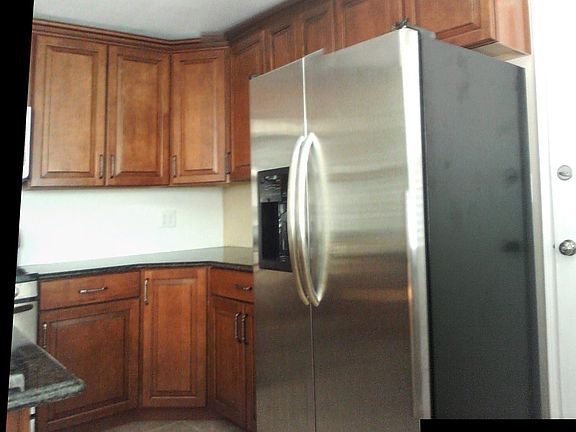 Refrigerator and cabinets