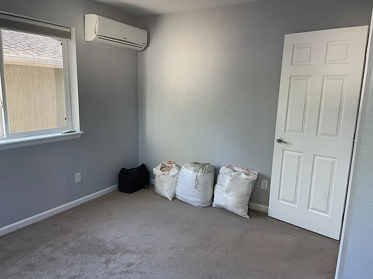 bedroom north facing window. newer carpet