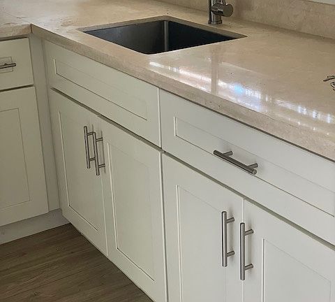 kitchen w new cabinets, counters and appliances