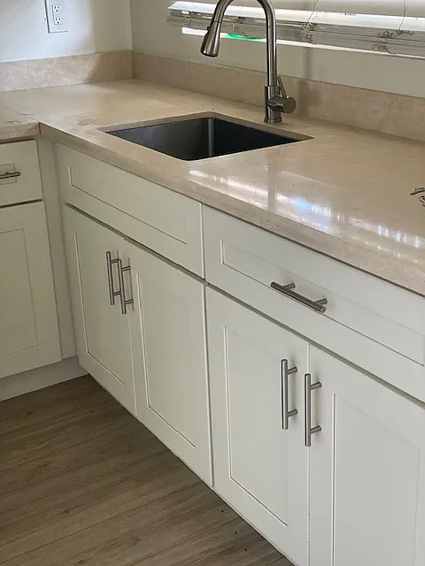 kitchen w new cabinets, counters and appliances