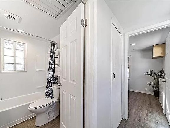 Hallway to bathroom and bedroom