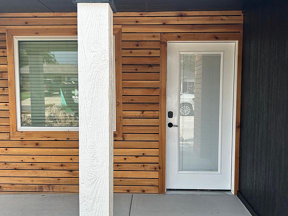 NEW ENTRY WITH DECOR CEDAR PANELS