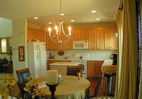BRIGHT KITCHEN WHARDWOOD FLOORS  ISLAND WWALKOUT TO DECK