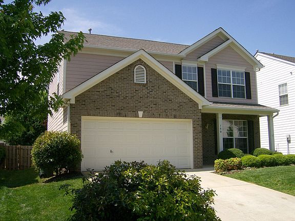 Left side of the home; 2 car garage
