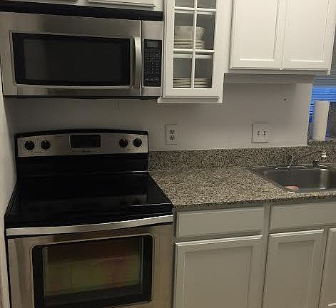 Newly updated kitchen with granite, new counter tops, stainl
