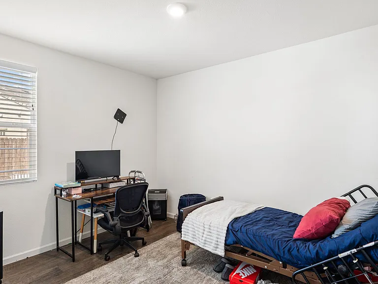 A full downstairs bedroom #2 and bathroom offer ideal multi-generational living