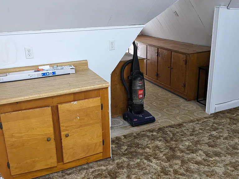 Third floor, office/playroom with a convenient half bathroom