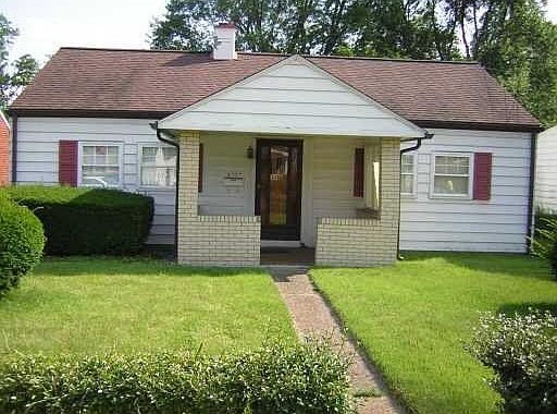 2 bedroom one bath house with large yard and detached garage