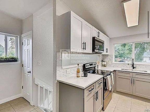 4th image of 7110 E 63rd Ave