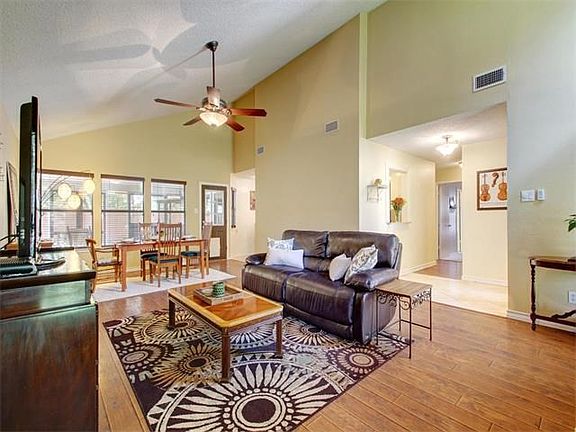 Living area with high ceilings