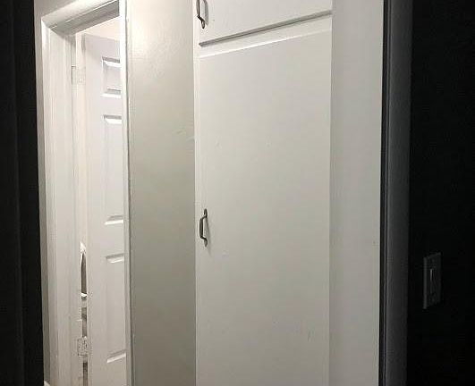 Linen closets in hallway