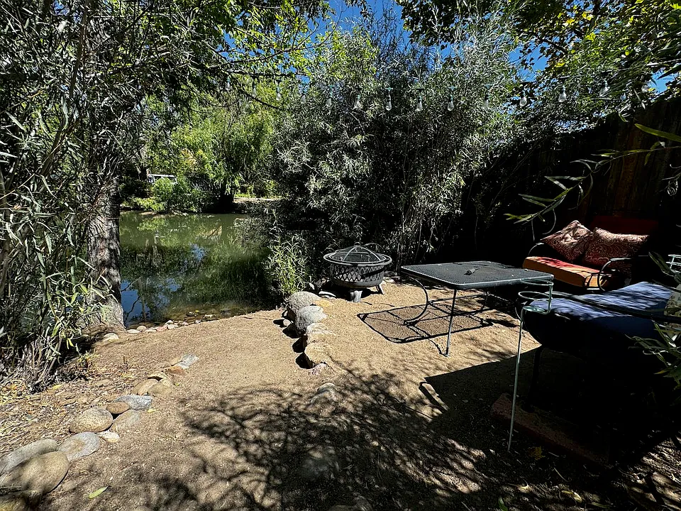 Pond sitting area that is 200 ft from the unit.